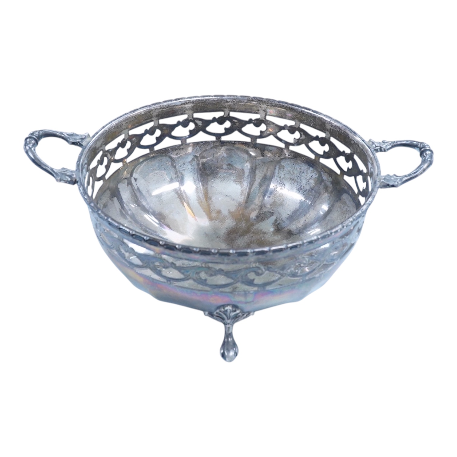 A George V silver two handled fruit bowl, with a pierced border, by Peerless Plate Manufacturing Co, Sheffield, 1929, 17.9cm excluding the handles, 14.5oz.